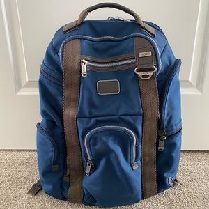 Tumi backpack navy blue with straps & laptop compartment